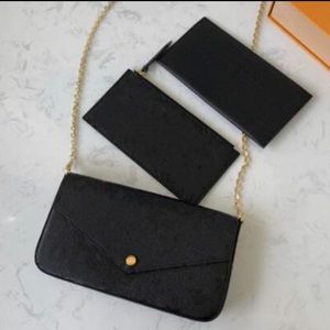 Black crossbody bag 3 piece pochette.